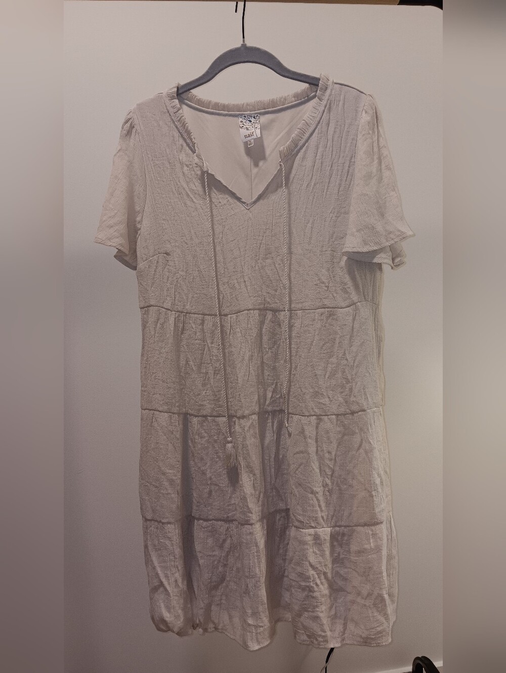 NAIF Light Beige Tiered V-Neck Tunic with Drawstring